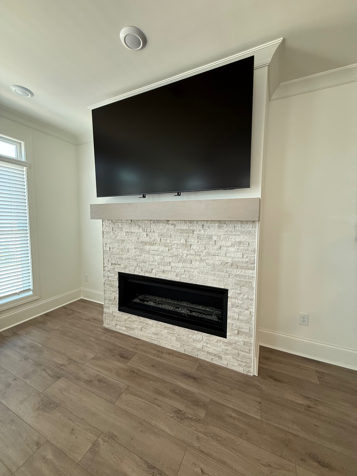 75-inch MantelMount TV installation on Drywall in Atlanta, GA