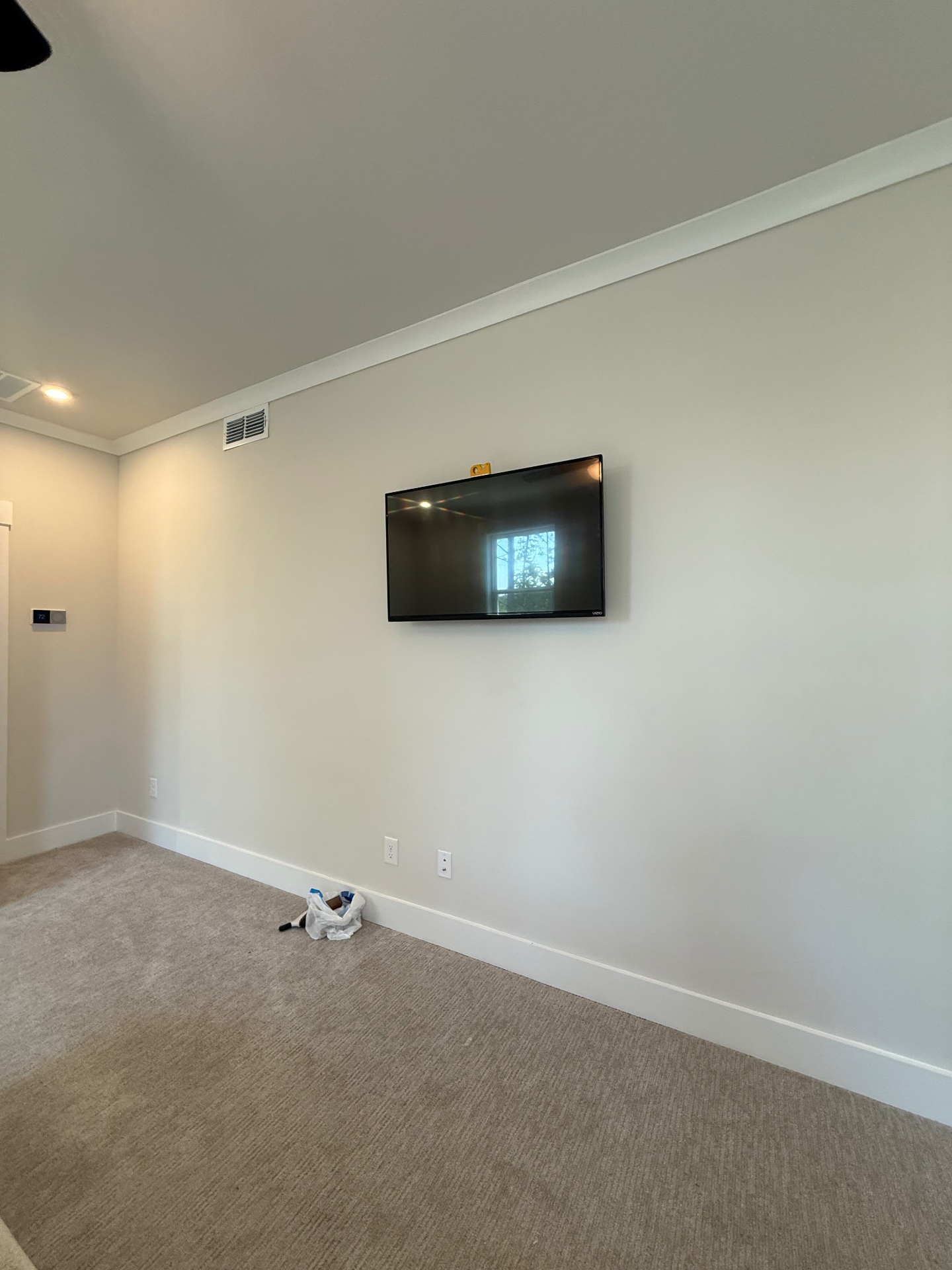 55-inch Tilt TV installation on Master Bedroom Drywall in Jonesboro, GA
