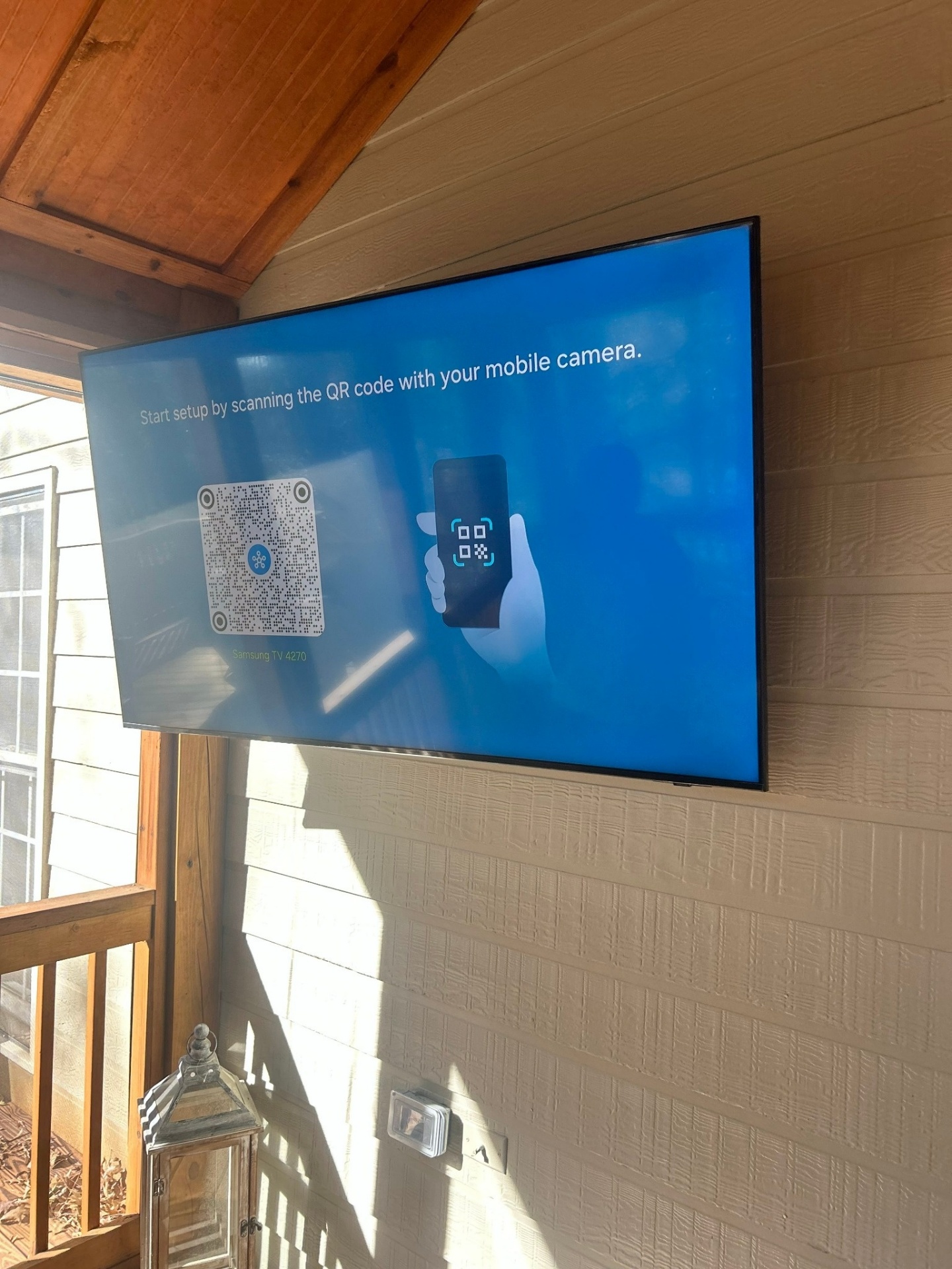 Samsung outdoor TV mounted on patio wall in Grayson, GA with weatherproof bracket