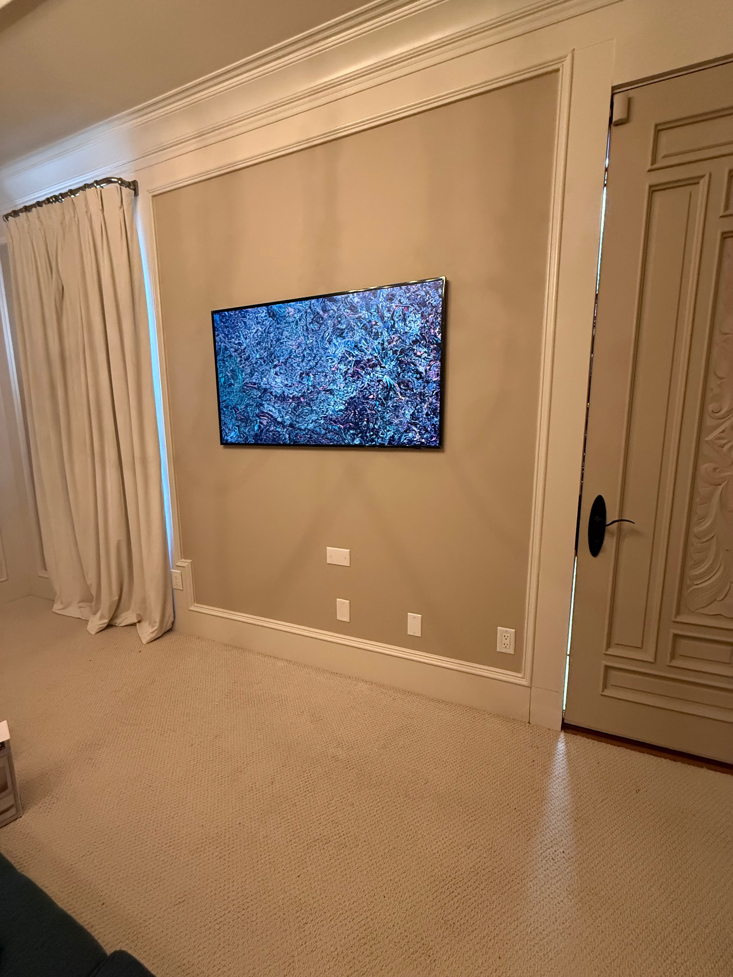 TV mounted with in-wall cable management and recessed outlet in Sandy Springs, GA