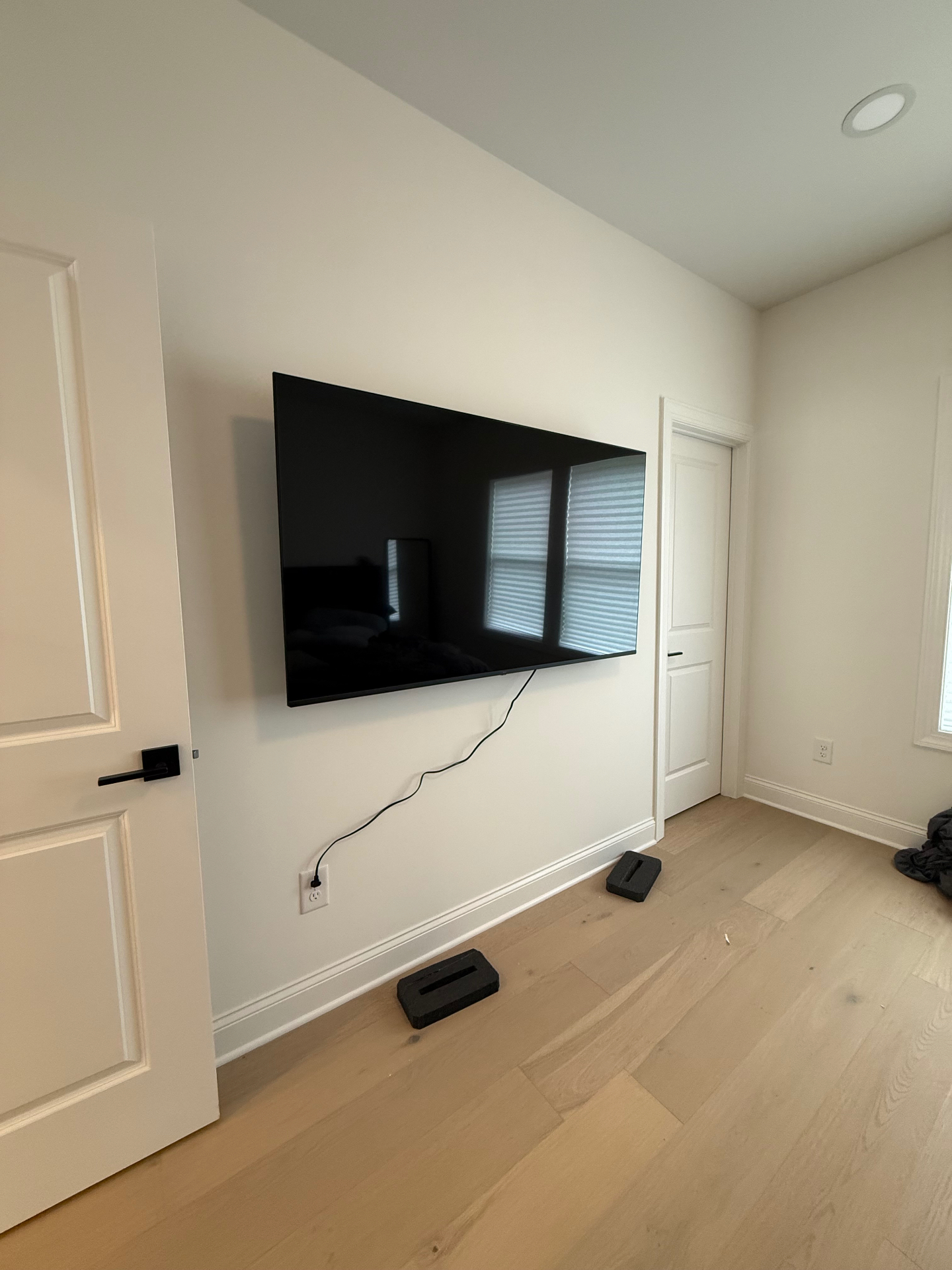 65-inch Fixed TV installation on Drywall in Woodstock, GA