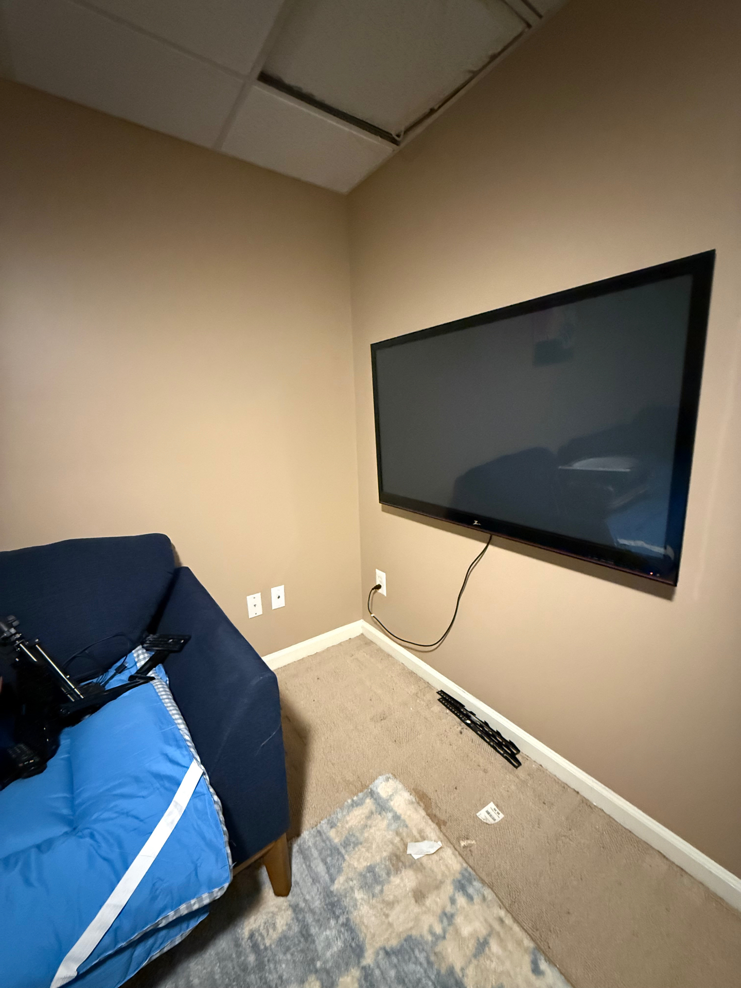 65-inch Tilt TV installation on Drywall in Woodstock, GA