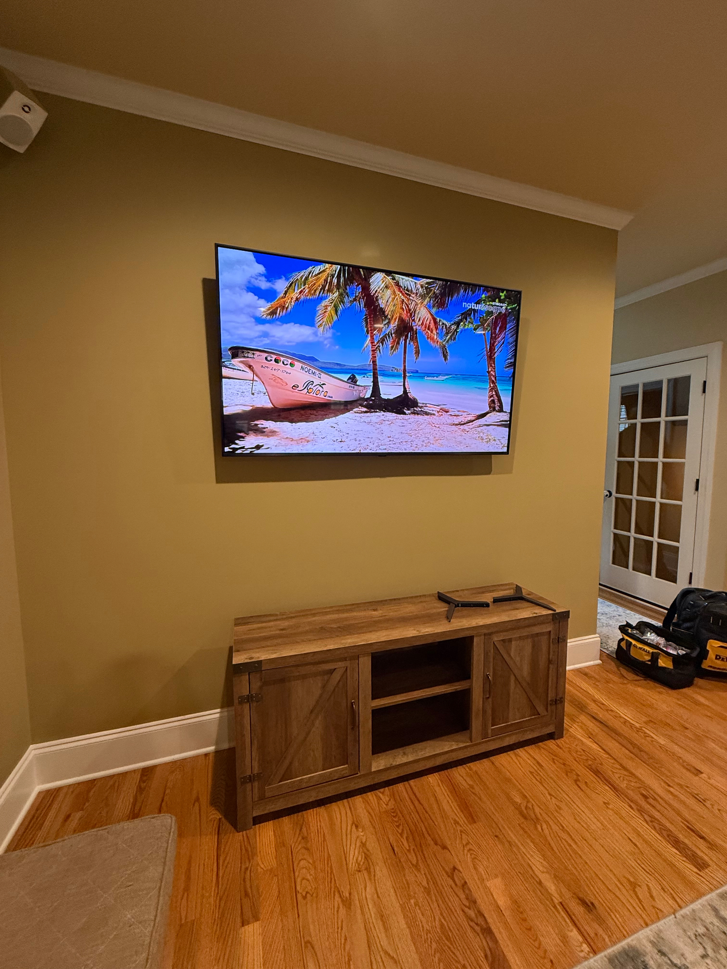 65-inch Full Motion TV installation on Drywall in Kennesaw, GA