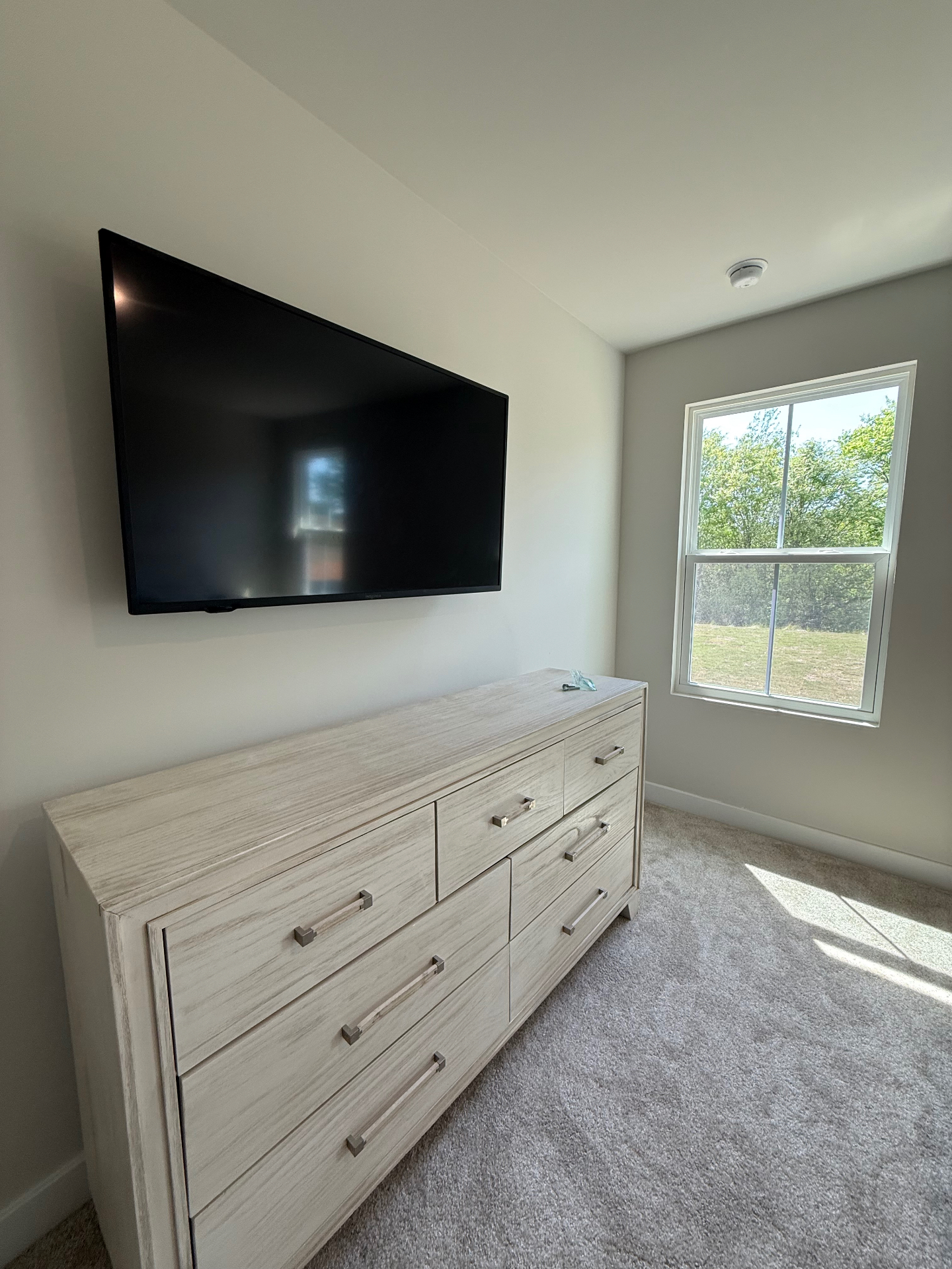 55-inch Full Motion TV installation on Bedroom Drywall in Calhoun, GA