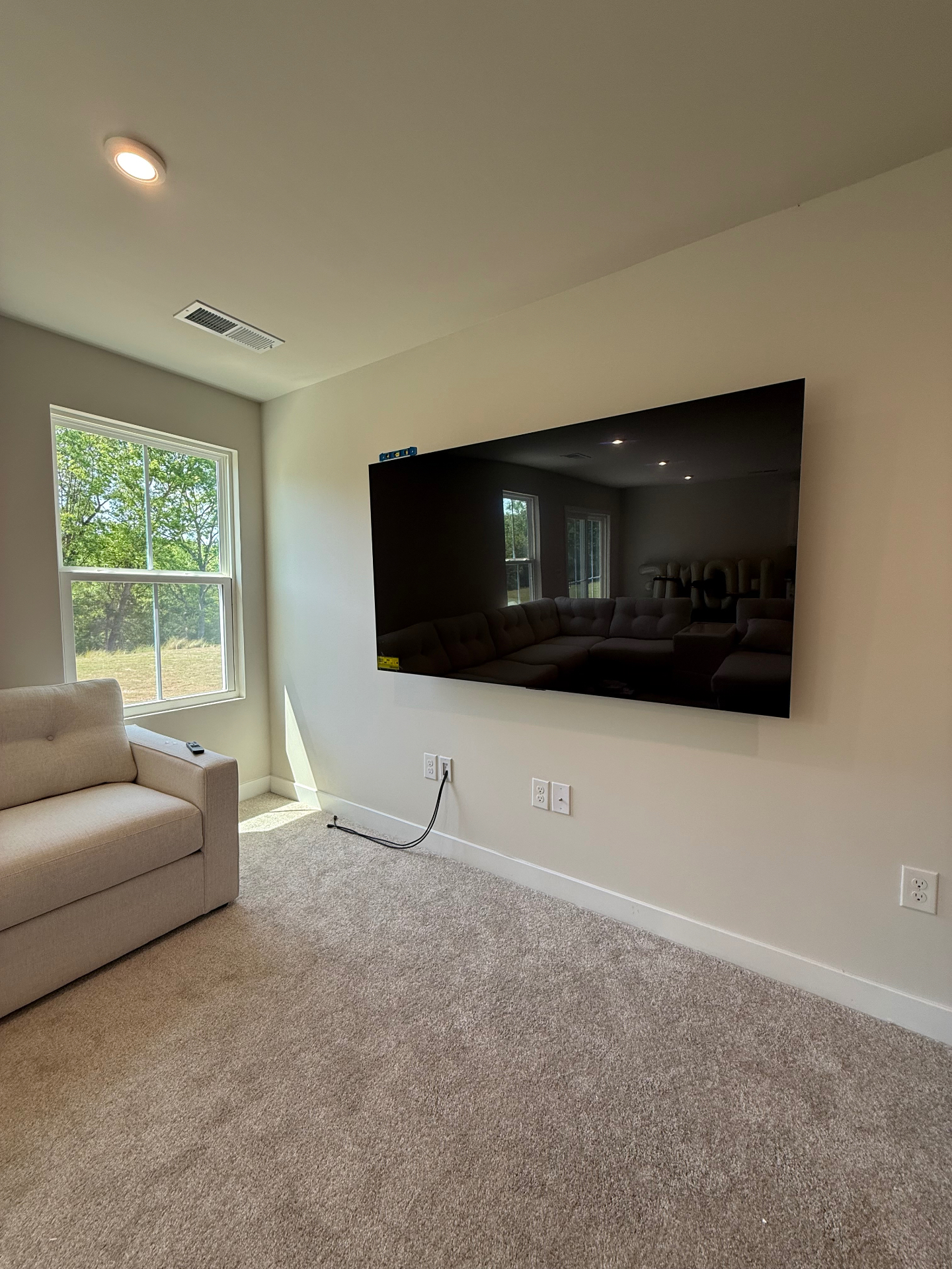 75-inch Full Motion TV installation on Drywall in Calhoun, GA