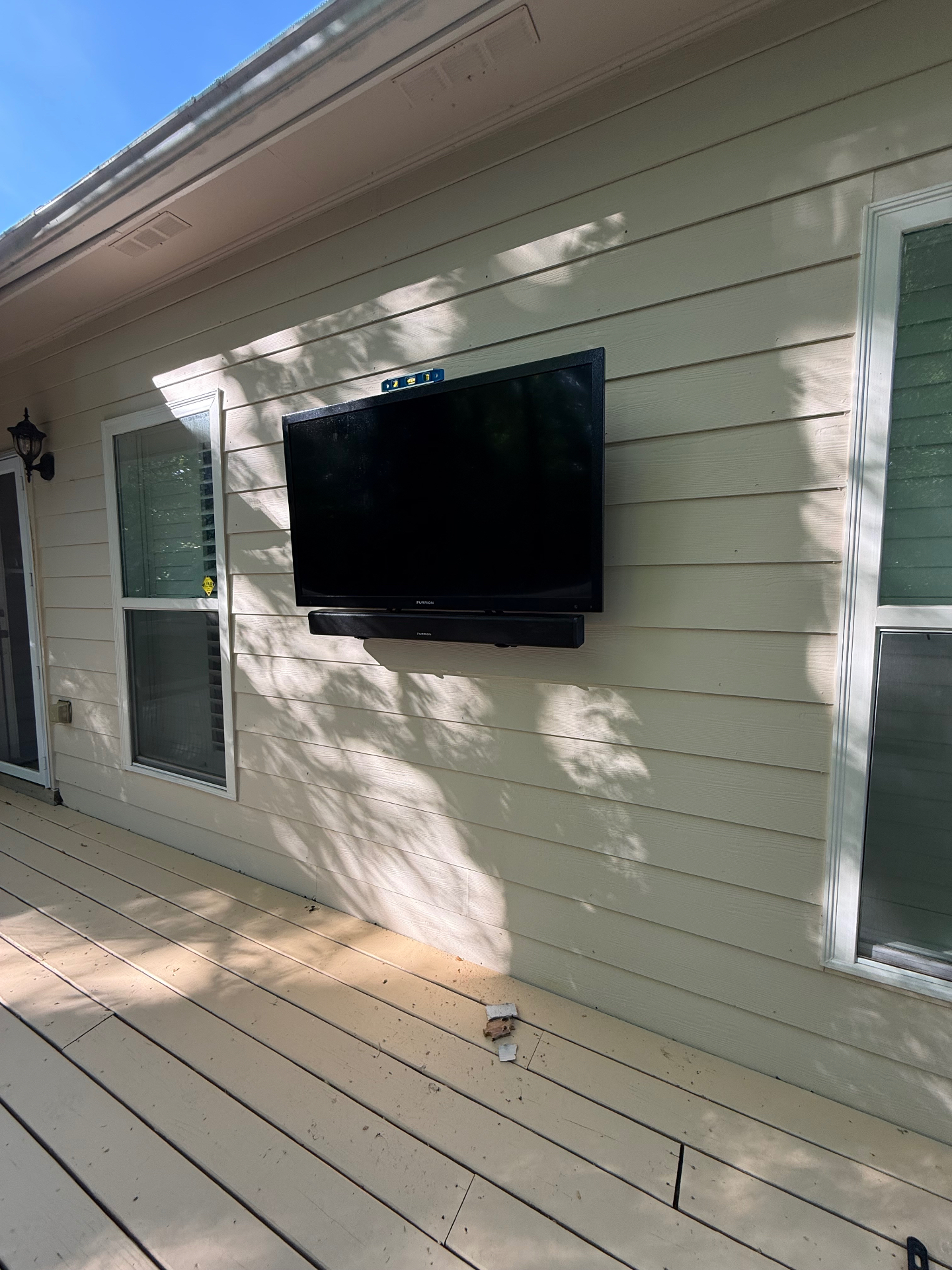 55-inch Full Motion TV installation on Hardie Board Siding in Dunwoody, GA